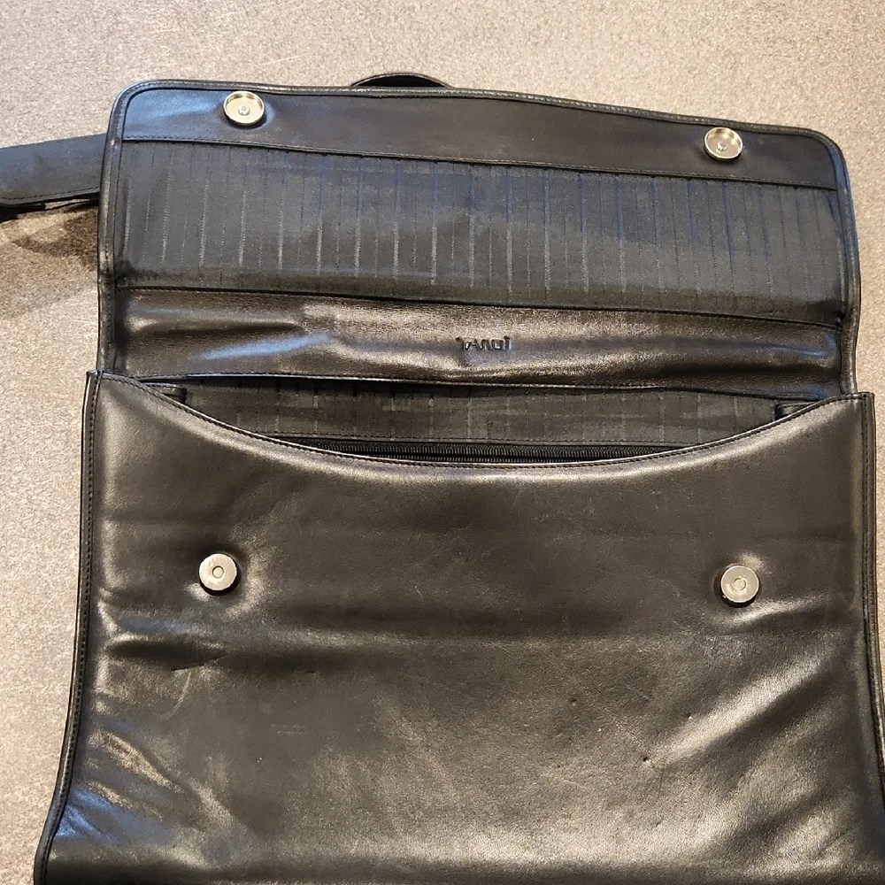 Tandi black leather briefcase featuring both top handles adjustable strap P-001